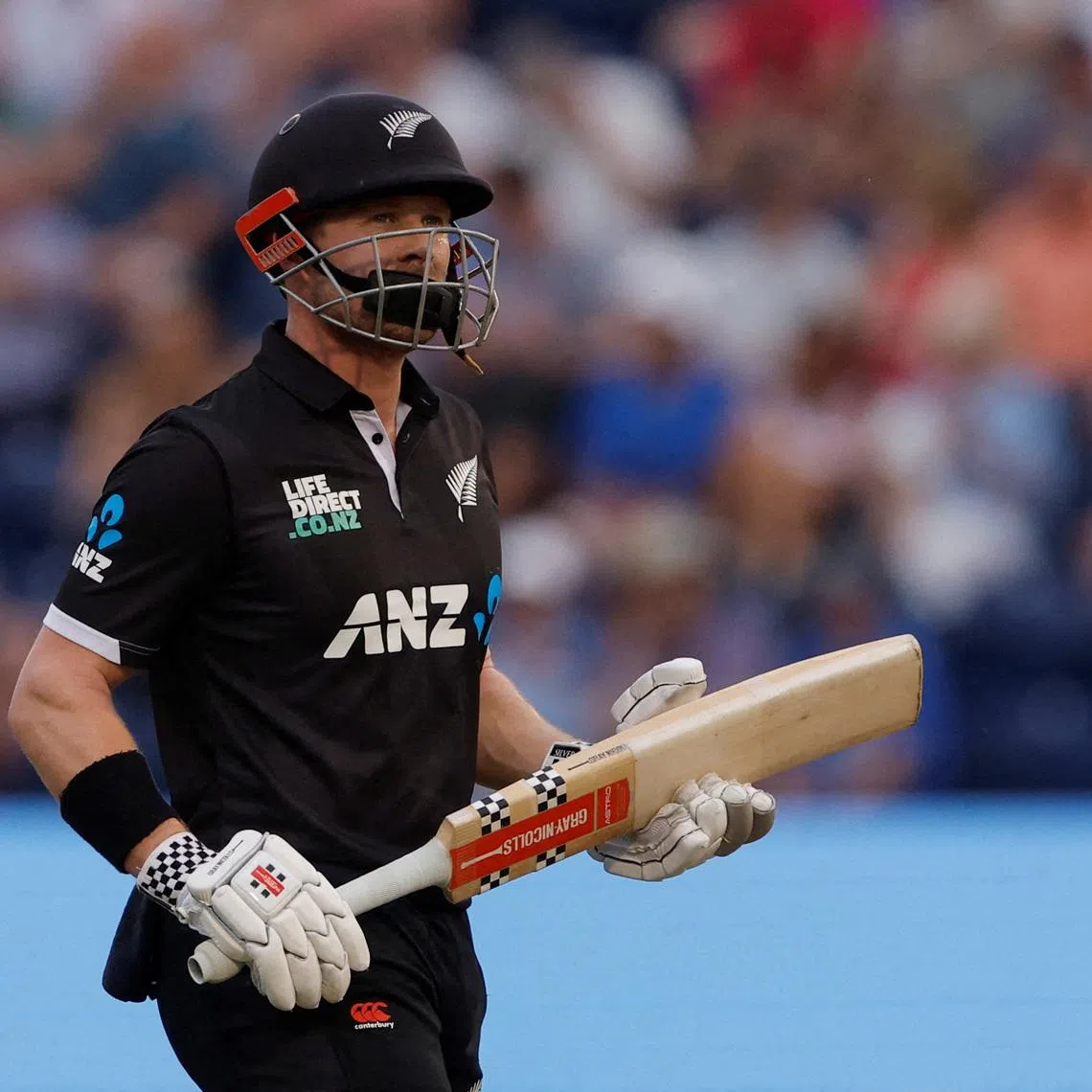 FILE PHOTO: Cricket - One Day International - England v New Zealand - Sophia Gardens, Cardiff, Wales, Britain - September 8, 2023 New Zealand's Henry Nicholls leaves the field after losing his wicket Action Images via Reuters/Andrew Couldridge/File Photo