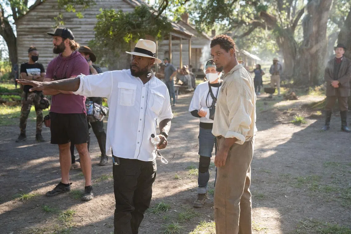 Film-maker Antoine Fuqua (left) and actor Will Smith on the set of Emancipation.