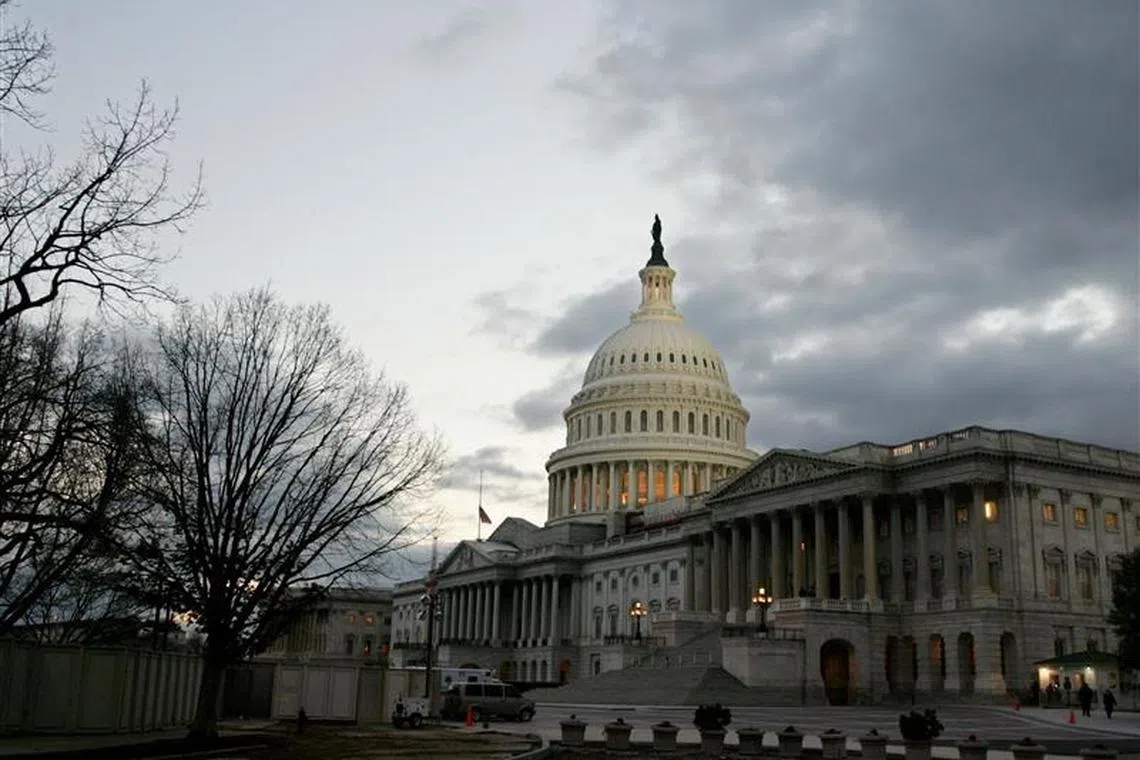 FILE PHOTO: The dome of the United States Capitol building is illuminated at twilight on Capitol Hill in Washington January 31, 2006./File photo