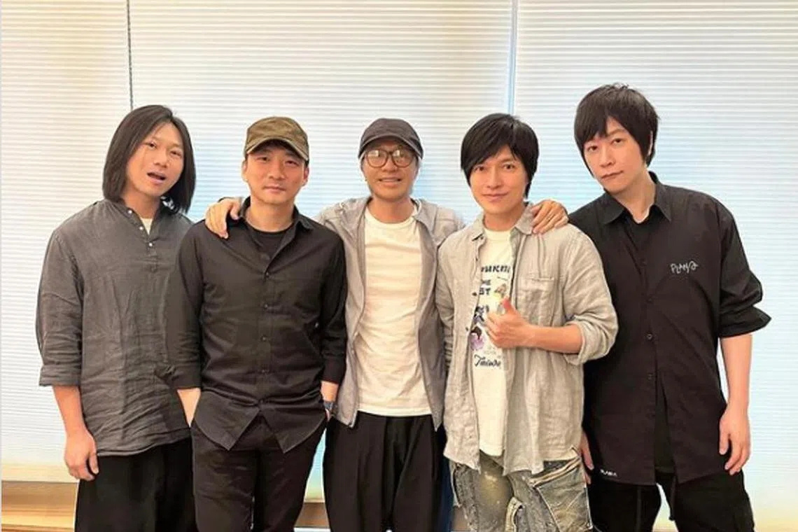 Hong Kong director Stephen Chow (centre) with Mayday members (from left) Masa, Stone, Monster and Ashin. The fifth member of the band, drummer Guan You, was not present.