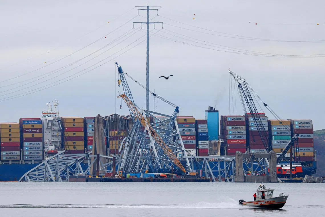 Wreckage of the Francis Scott Key bridge lies across the deck of the Dali cargo vessel as salvage work continues in Baltimore on April 1. 