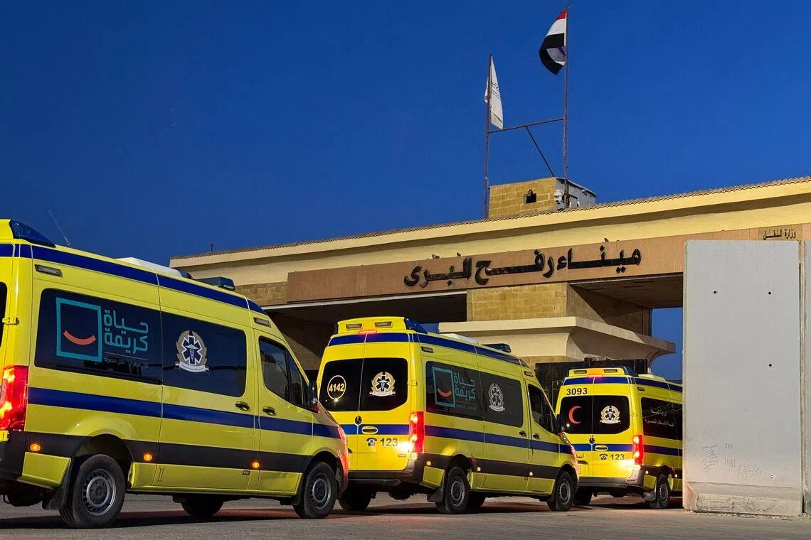 Ambulances waiting at the Egyptian side of the Rafah border crossing with the Palestinian Gaza Strip on Feb 2.