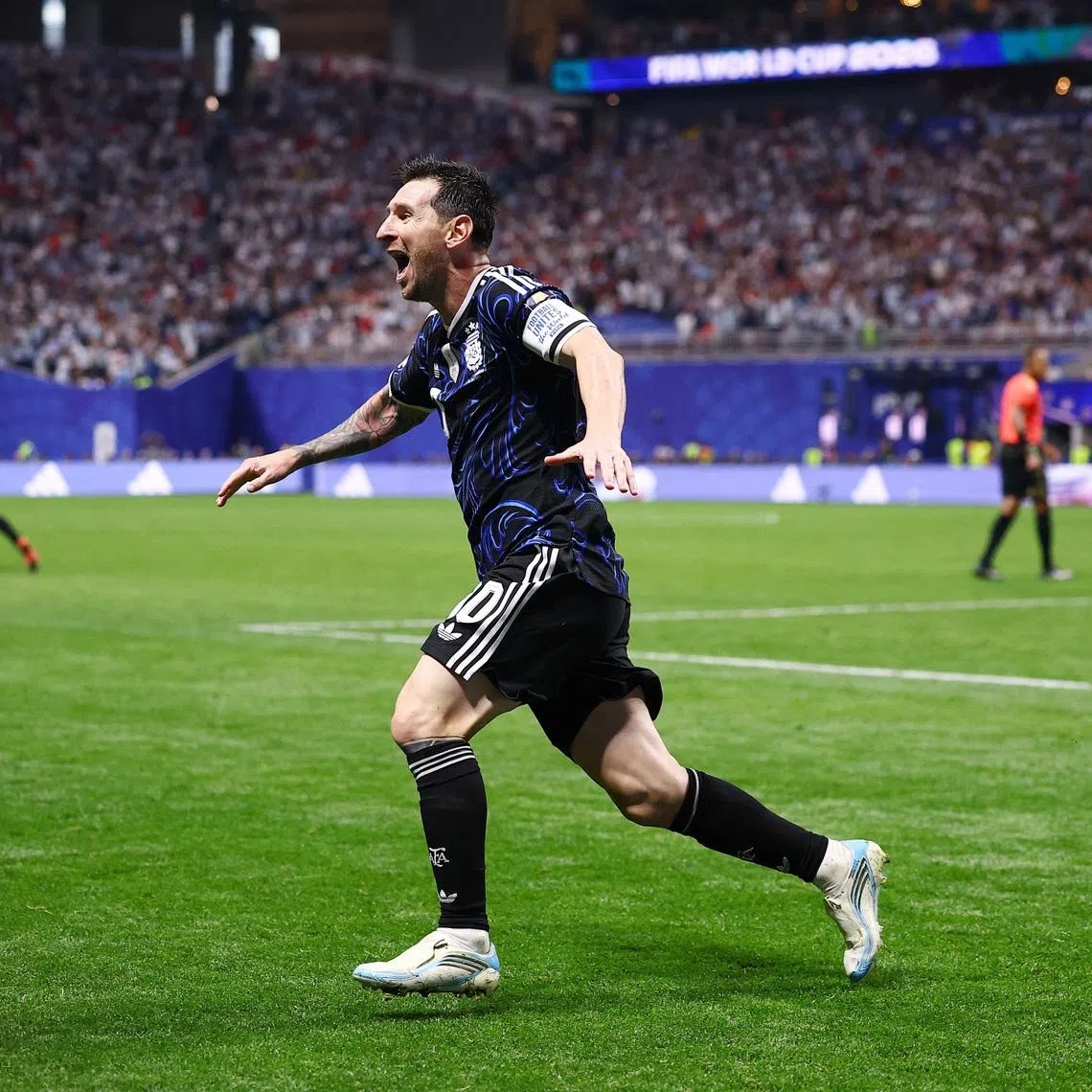 Soccer Football - FIFA World Cup 2026 - Semi Final - England v Argentina - Atlanta Stadium, Atlanta, Georgia, U.S. - July 15, 2026 Argentina's Lionel Messi celebrates after Lautaro Martinez scores their second goal REUTERS/Agustin Marcarian