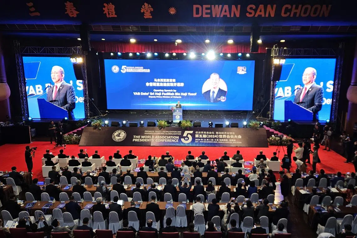 whmca02 - In the opening speech of 5th World Association Presidents’ Conference. Malaysia's Deputy Prime Minister Fadillah Yusuf said clean and renewable energy were among the areas of cooperation in Malaysia-China bilateral relationship.

ST Photo: Lu Wei Hoong