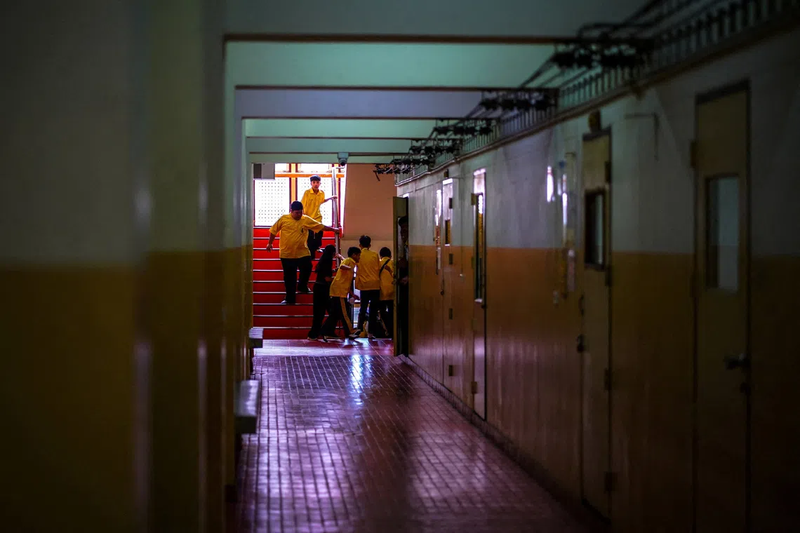 Students taking part in a “run, hide, fight” exercise at the Surasamontree School in Bangkok on Aug 19.