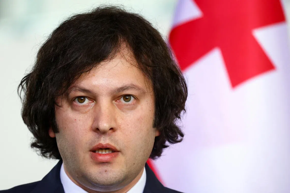 FILE PHOTO: Georgian Prime Minister Irakli Kobakhidze attends a press conference following a meeting with German Chancellor Olaf Scholz, in Berlin, Germany, April 12, 2024. REUTERS/Nadja Wohlleben/File Photo