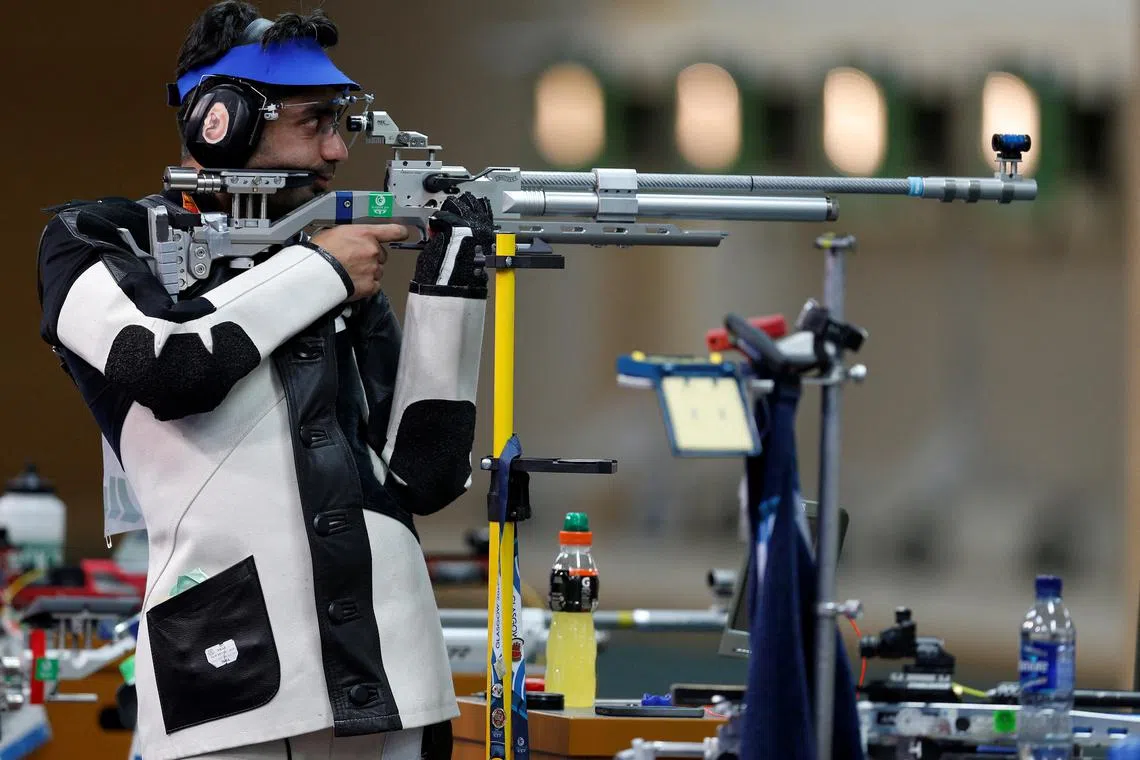FILE PHOTO: India's Abhinav Bindra, winner of the men's 10m air rifle shooting event at the 2014 Commonwealth Games in Glasgow, Scotland, July 25, 2014. REUTERS/Russell Cheyne/File Photo