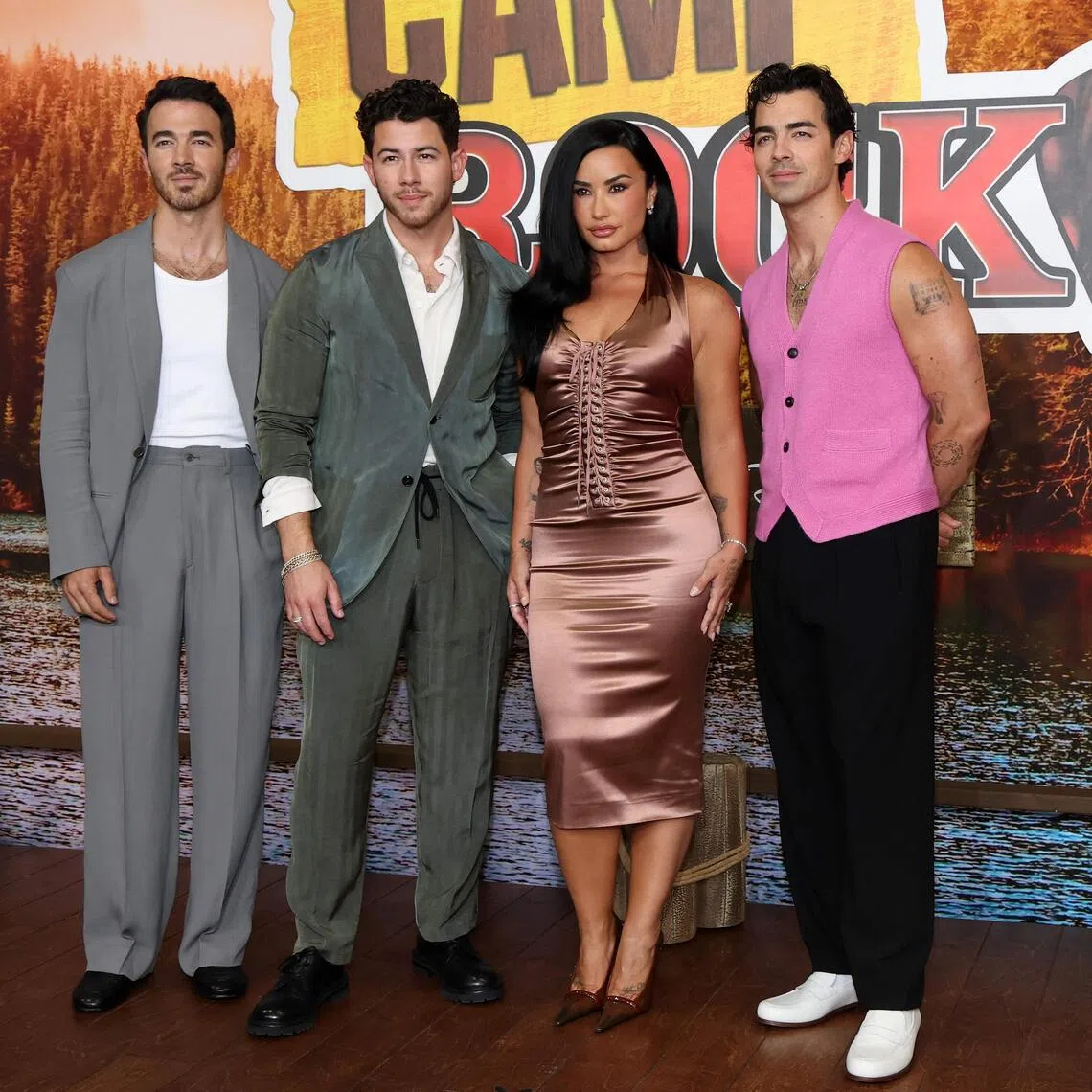 (From left) Kevin Jonas, Nick Jonas, Demi Lovato and Joe Jonas at the premiere of Camp Rock 3 in Burbank, California on Aug 10.