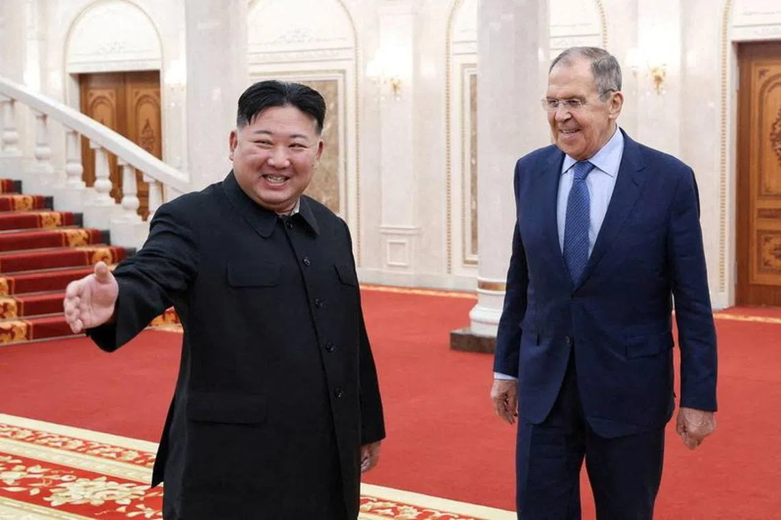 FILE PHOTO: North Korean leader Kim Jong Un welcomes Russian Foreign Minister Sergei Lavrov during a meeting in Pyongyang, North Korea, October 19, 2023. Russian Foreign Ministry/Handout via REUTERS/File Photo