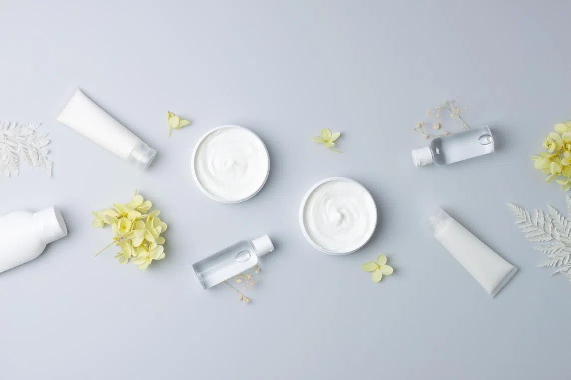hbskin19 - Cosmetic skin care products with with flowers on grey background. Flat lay, copy space

Credit: ISTOCKPHOTO