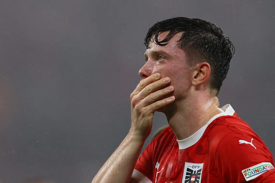 Soccer Football - Euro 2024 - Round of 16 - Austria v Turkey - Leipzig Stadium, Leipzig, Germany - July 2, 2024 Austria's Michael Gregoritsch looks dejected after the match REUTERS/Thilo Schmuelgen