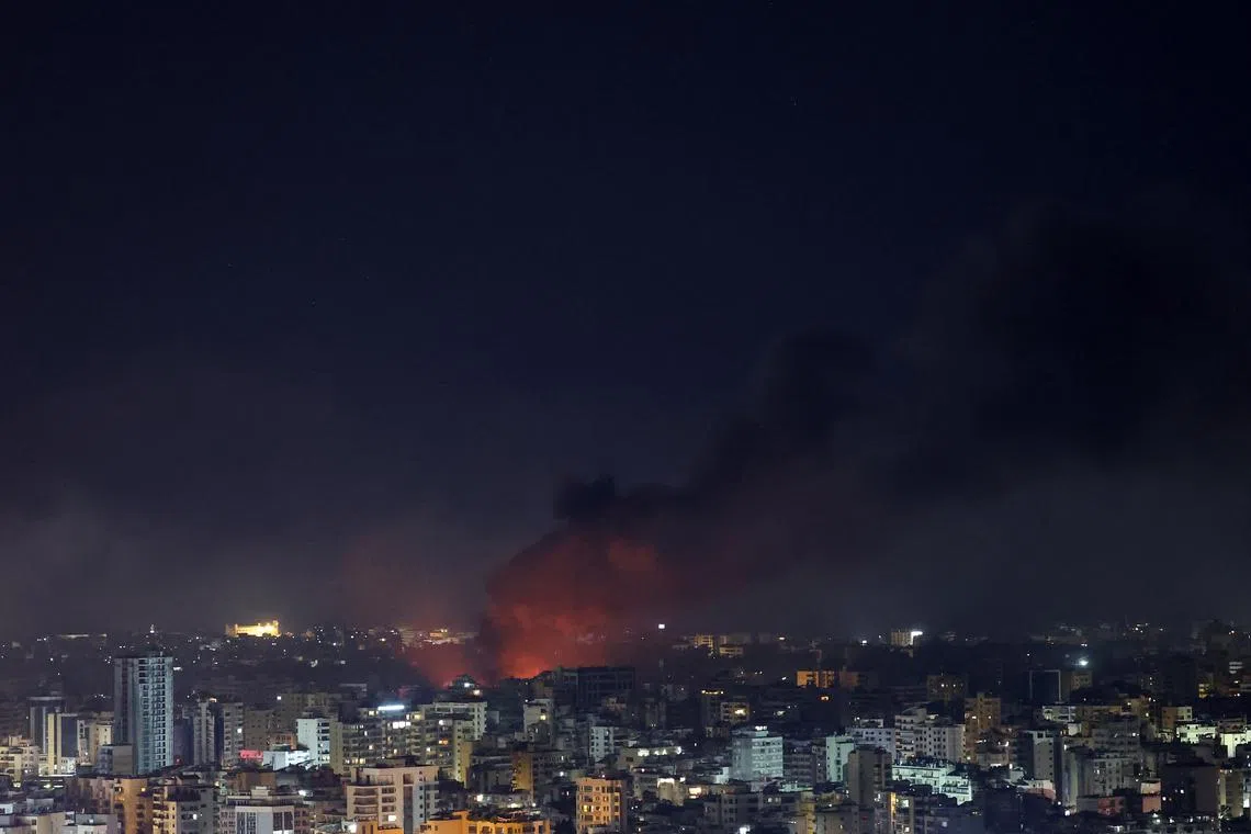 Fire and smoke rise over Beirut's southern suburbs after a strike, amid ongoing hostilities between Hezbollah and Israeli forces, as seen from Sin El Fil, Lebanon, October 3, 2024. REUTERS/Amr Abdallah Dalsh