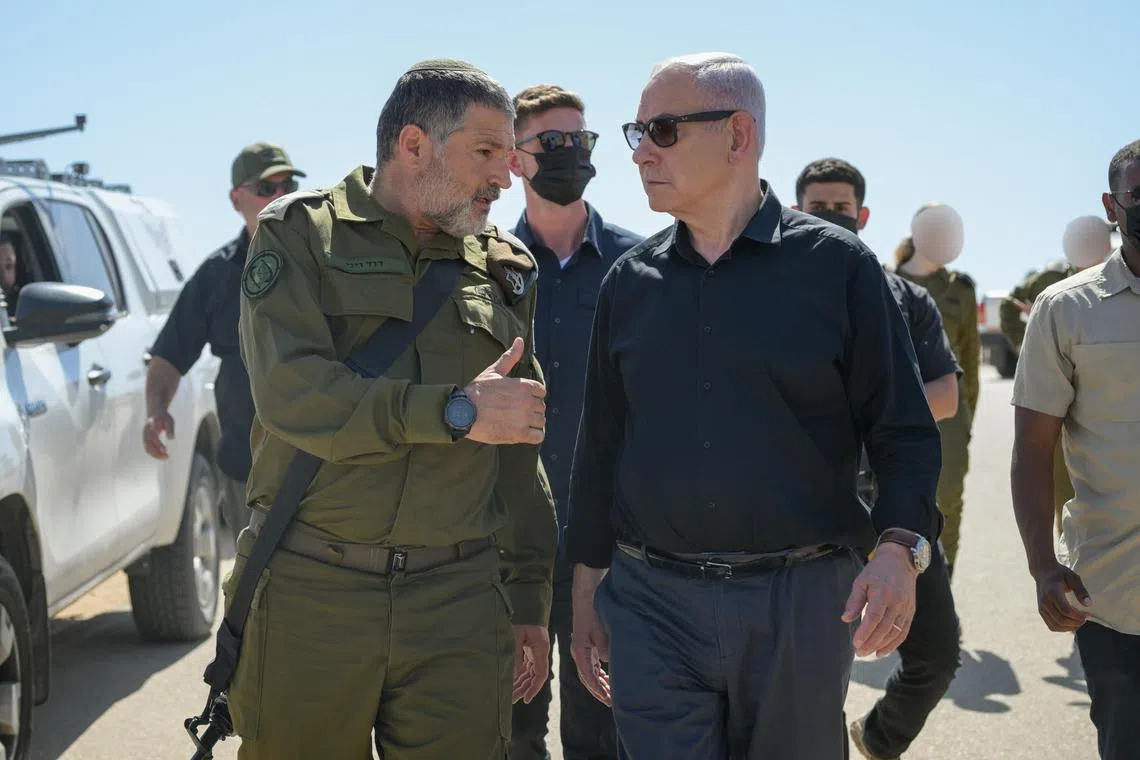 Israeli PM Benjamin Netanyahu's appointment of Maj Gen David Zini (left) as head of Shin Bet drew conflict of interest concerns.