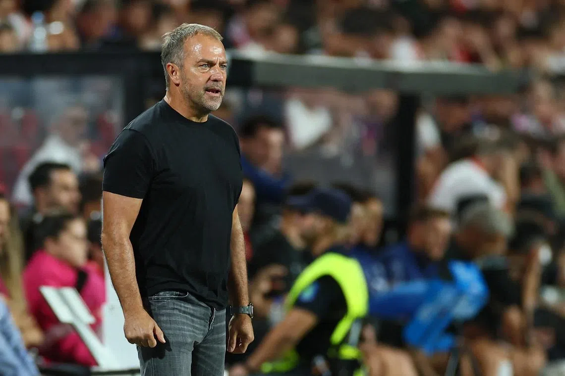 FILE PHOTO: Soccer Football - LaLiga - Rayo Vallecano v FC Barcelona - Campo de Futbol de Vallecas, Madrid, Spain - August 31, 2025 FC Barcelona coach Hansi Flick REUTERS/Isabel Infantes/ File Photo