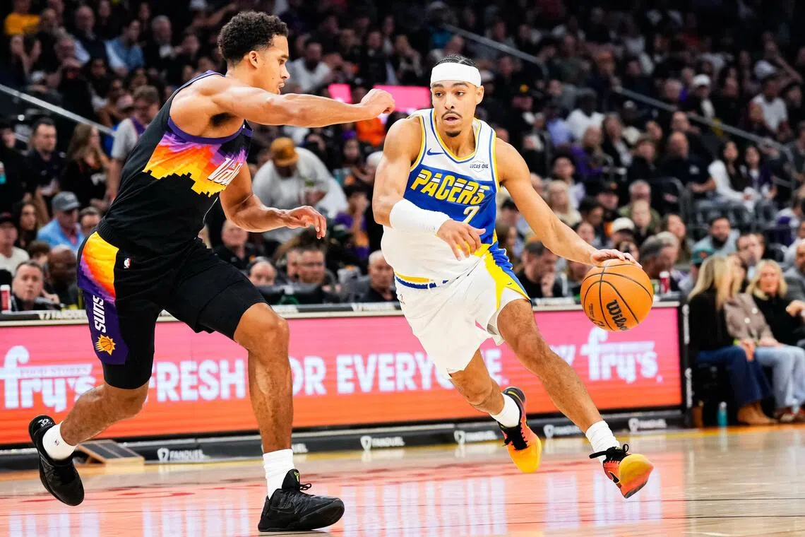 Indiana Pacers guard Andrew Nembhard drives to the basket against the Phoenix Suns during the first half at Mortgage Matchup Center.