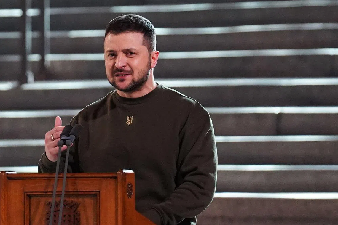 Ukraine's President Volodymyr Zelensky addresses British MPs in London, on Feb 8, 2023.