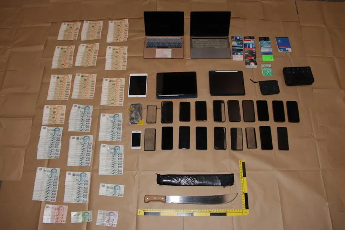 During the operation, police seized cash totalling over $13,000, two laptops, 32 bank cards, 23 mobile devices, drug paraphernalia, and a knife.