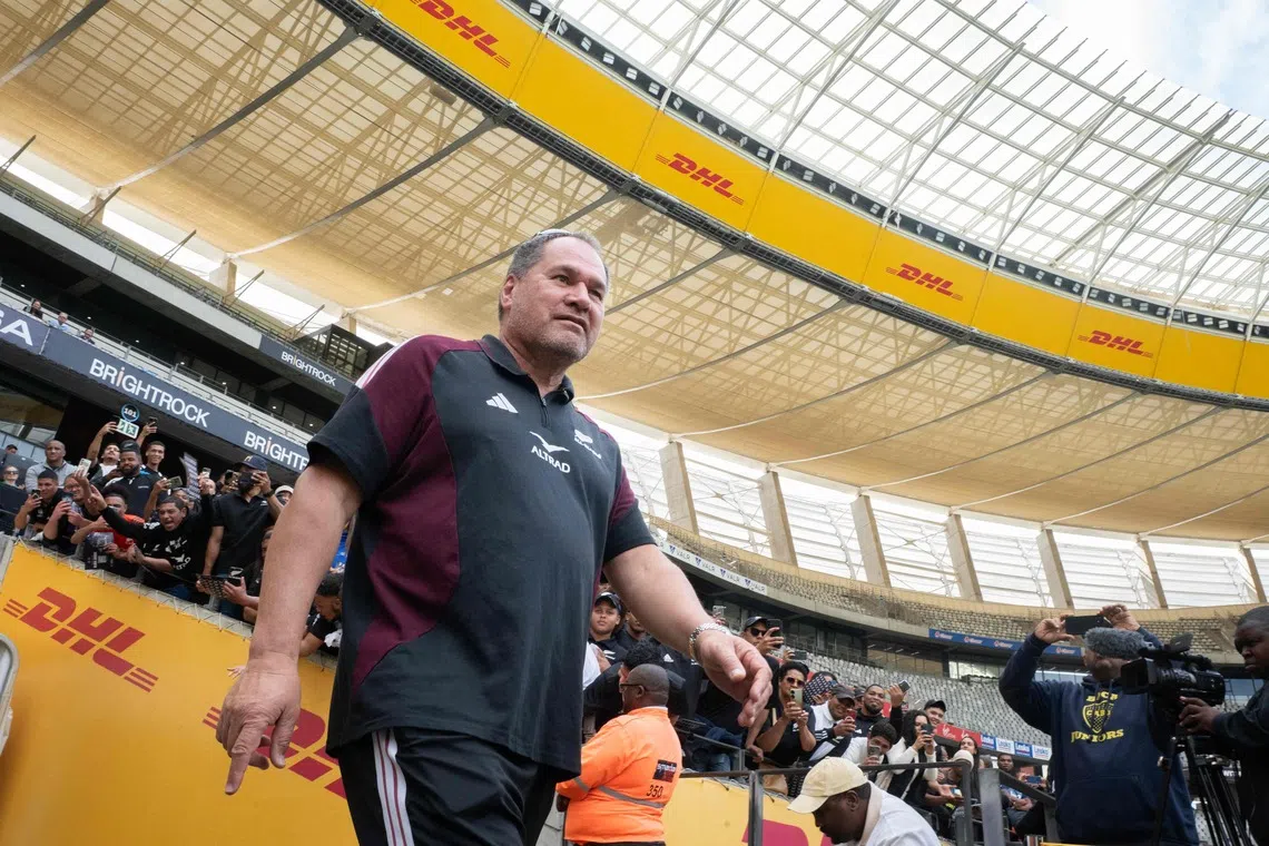 All Blacks fans cheer as New Zealand coach Dave Rennie arrives at the Cape Town Stadium on July 31.