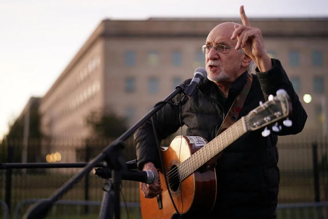 American singer Peter Yarrow, founding member of the legendary folk group Peter, Paul And Mary, speaks about the 1967 March on the Pentagon during a vigil marking the 50th anniversary of the protest in 2017 in Virginia. Yarrow died of bladder cancer on Jan 7, 2025, in New York.