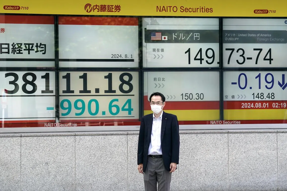 Tokyo shares led losses, plunging 5 per cent after sharp gains by the yen following a Bank of Japan rate hike.