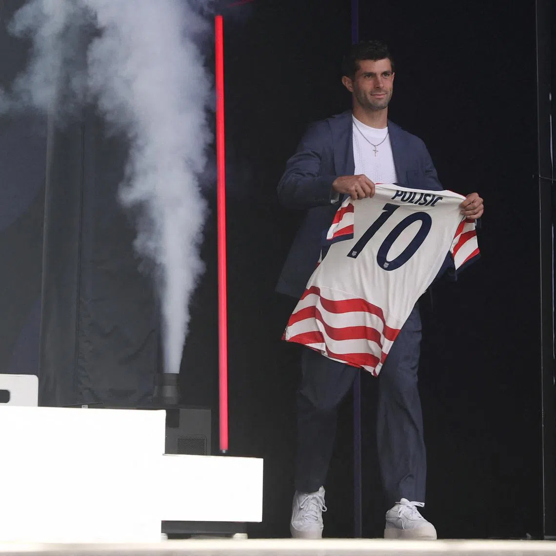 May 26, 2026; New York, New York, USA; Christian Pulisic walks on stage during the United States men's national team roster reveal for the 2026 FIFA World Cup at The Rooftop at Pier 17. Mandatory Credit: Pamela Smith-Imagn Images