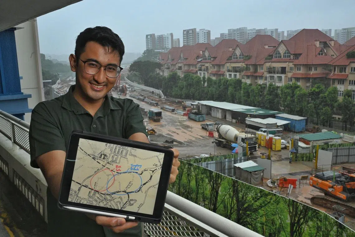 ST20250407_202593900581 kgkampong Chong Jun Liang
Rustam Shariq Mujtaba, founder of Project Broken Barges with an old map of Kampong Tongkang Pechah that used to sit on present day Fernvale estate photographed at 412a Fernvale Link on April 7, 2025 . The project is a citizen-led initiative committed to documenting kampong stories. A descendant of former residents of Kampong Tongkang Pechah, Rustam has pored through libraries, old maps and photographs to piece together information on the area. The 28-year-old data analyst is hoping to complement his research with the oral histories of former residents of the kampong and those who lived nearby in Jalan Kayu, Seletar Hills, etc.