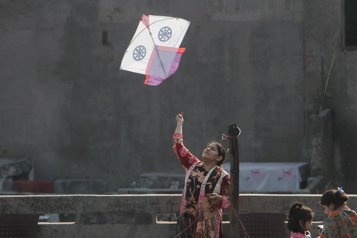 Kites and victory cries fill Lahore skies as festival returns after 18-year ban