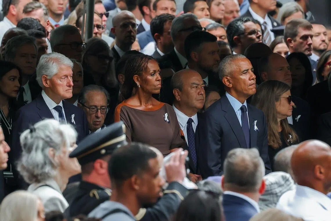 Former presidents Bill Clinton and Barack Obama and former first lady Michelle Obama attend ceremonies marking the 25th year since the Sept 11, 2001, terror attacks.