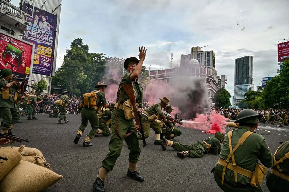 A re-enactment of the Battle of Surabaya, the peak of the battle which took place in November 1945 between Indonesian nationalists against British and British Indian forces for the re-imposition of Dutch colonial rule following the end of World War II, in Surabaya, Indonesia, on Nov 2, 2025. 