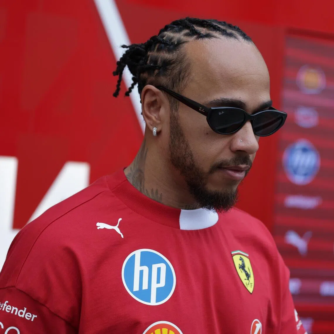epa12571463 Scuderia Ferrari driver Lewis Hamilton of Britain arrives ahead of a practice session for the Formula One Abu Dhabi Grand Prix, in Abu Dhabi, United Arab Emirates, 05 December 2025. The 2025 Formula One Abu Dhabi Grand Prix will be held at the Yas Marina Circuit racetrack on 07 December.  EPA/ALI HAIDER