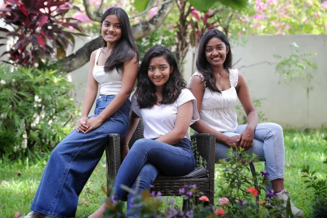 ST20230607_202334615852 : Gin Tay/ akblood14/ Amrita Kaur Gurder Singh/
(profiles for World Blood Donor Day)
(L-R):Profile of Nithiya ravindran 18, Raffles Institution; Nila ravindran 22, NUS undergrad; and Nithila ravindran 19, SMU undergrad; at their Yio Chu Kang home on June 7, 2023.