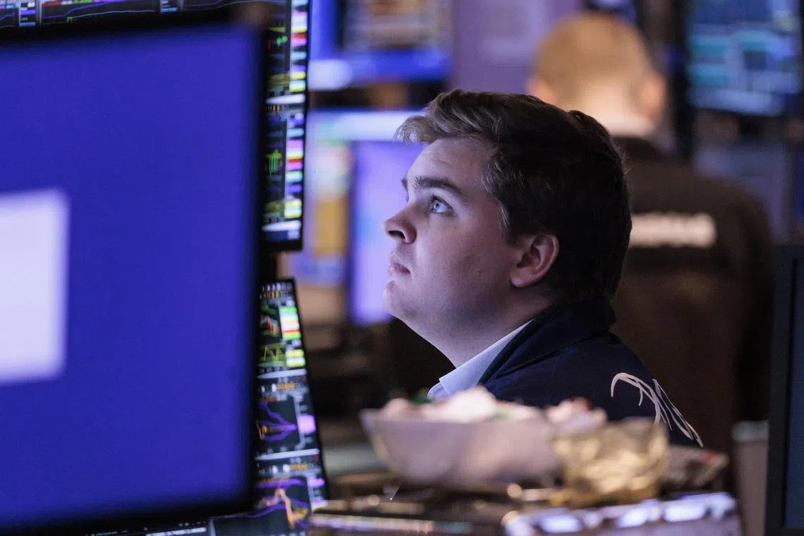 Traders work on the floor of the New York Stock Exchange, on Dec 2, 2022.