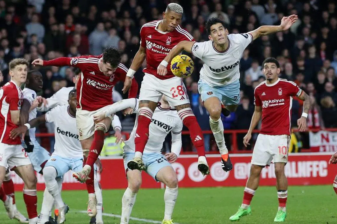 Soccer Football - Premier League - Nottingham Forest v West Ham United - The City Ground, Nottingham, Britain - February 17, 2024 Nottingham Forest's Danilo in action with West Ham United's Nayef Aguerd Action Images via Reuters/Ed Sykes