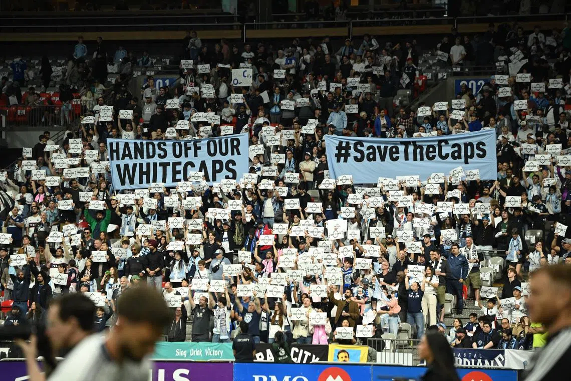 Apr 25, 2026; Vancouver, British Columbia, CAN;  Vancouver Whitecaps FC fans hold up signage prior to the first half against the Colorado Rapids at BC Place. Mandatory Credit: Simon Fearn-Imagn Images