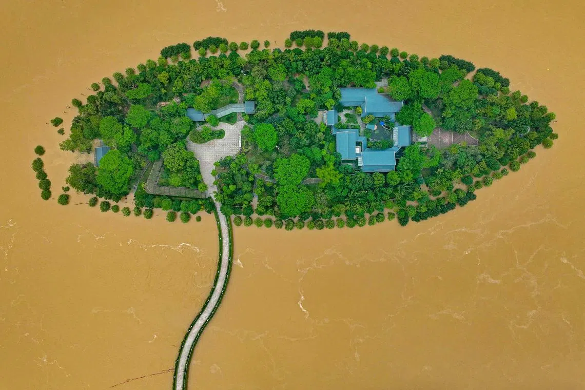 This aerial photograph taken on April 22, 2024,  shows a flooded island after heavy rains in Qingyuan, in southern China's Guangdong province. More than 100,000 people have been evacuated due to heavy rain and fatal floods in southern China.