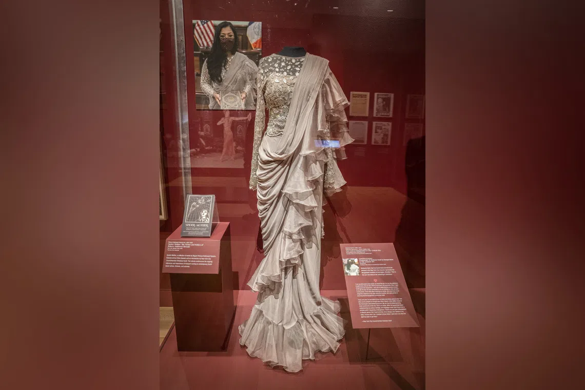 A sari that Ms Shahana Hanif, the first South Asian woman to be elected to the New York City Council, wore to her swearing-in ceremony in 2021, on display at the New York Sari exhibition.