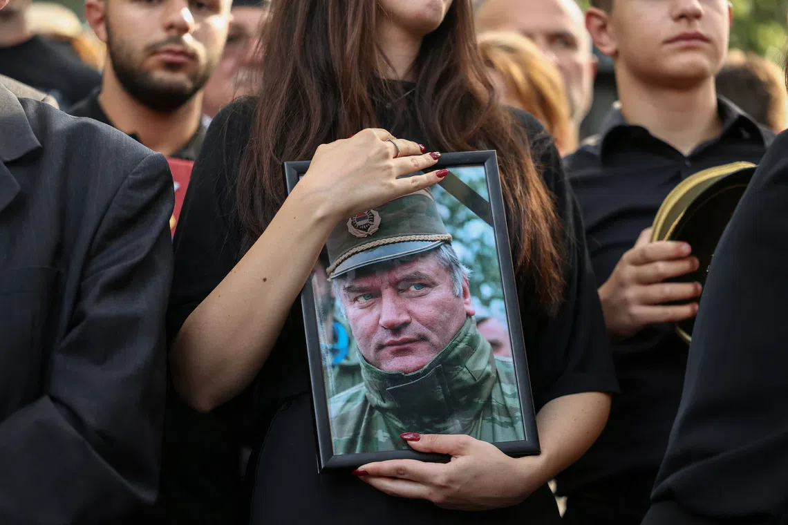 People attend a funeral of former Bosnian Serb wartime general Ratko Mladic at the Topcider Cemetery in Belgrade, Serbia, September 7, 2026. REUTERS/Zorana Jevtic