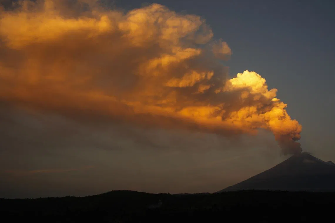 Ash and smoke spewing from the Popocatepetl volcano as seen from the San Nicolas de los Ranchos community, state of Puebla, Mexico, on May 23. 