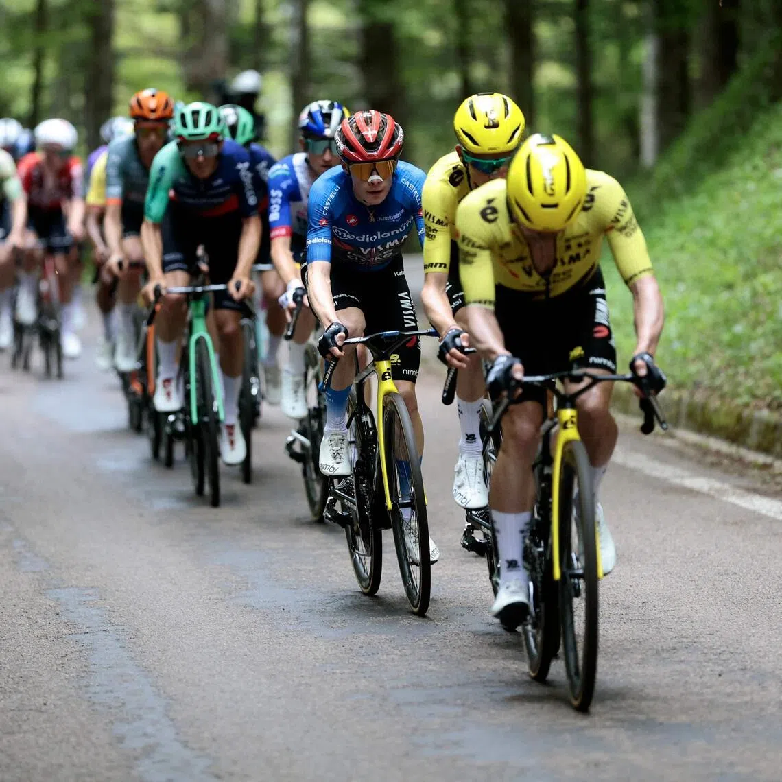 Team Visma Lease a Bike's Danish rider Jonas Vingegaard, wearing the best climber's blue jersey (Maglia Azzura), during the 9th stage of the Giro d'Italia  cycling race between Cervia and Corno alle Scale, near Doganaccia, central Italy on May 17, 2026.