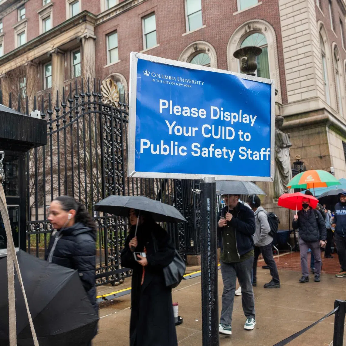 NEW YORK, NEW YORK - MARCH 24: Students wait in long security lines outside of Columbia University as demonstrators continue to rally in support of Palestine and to protest the arrest and detention of Mahmoud Khalil, a green card holder who played a role in pro-Palestinian protests, outside of Columbia University on March 24, 2025 in New York City. Protests were also over the university's recent agreement with the Trump administration to overhaul its protest policies, security practices and Middle Eastern studies department to continue receiving $400 million in federal funding.   Spencer Platt/Getty Images/AFP (Photo by SPENCER PLATT / GETTY IMAGES NORTH AMERICA / Getty Images via AFP)