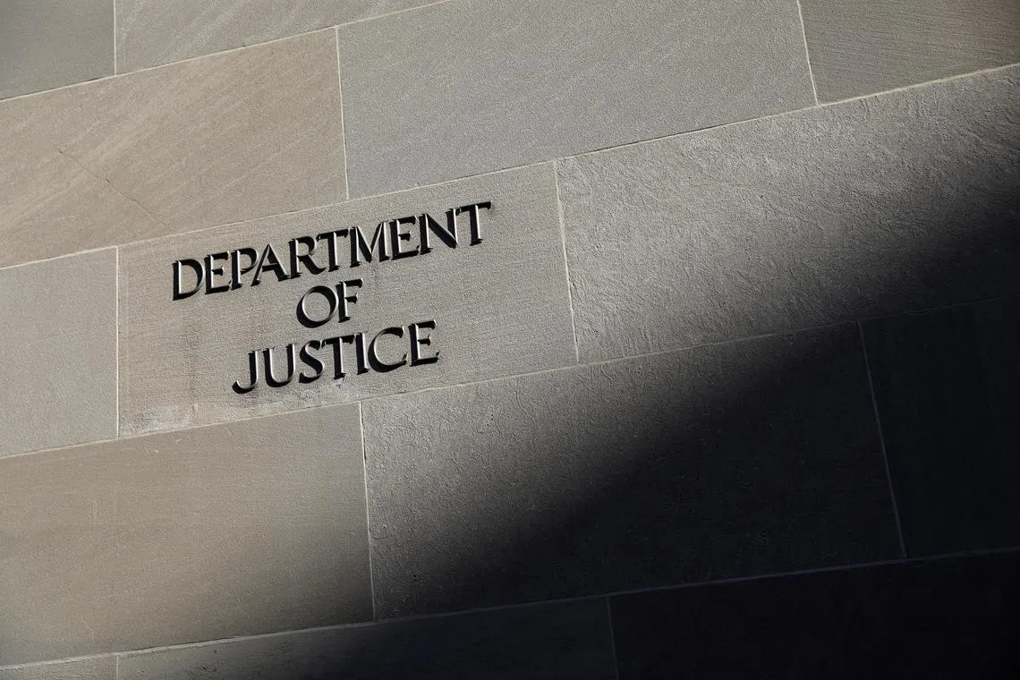 Signage is seen at the United States Department of Justice headquarters in Washington, D.C., U.S., August 29, 2020. REUTERS/Andrew Kelly/File Photo