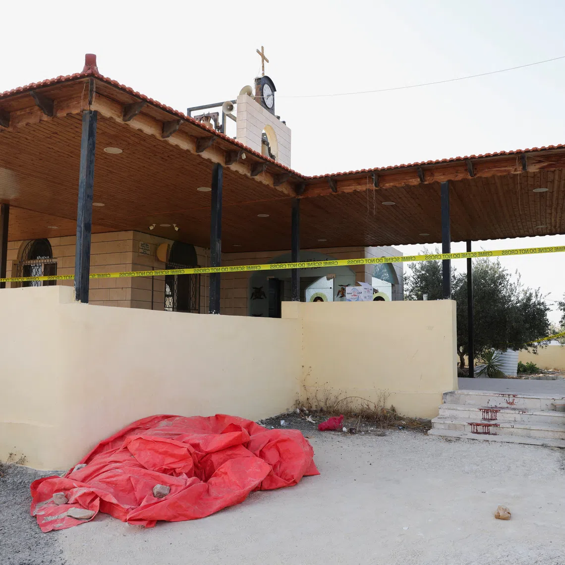 The Oct 23 assault during a funeral at a Greek Orthodox church in Jordan (above) had killed nine people.