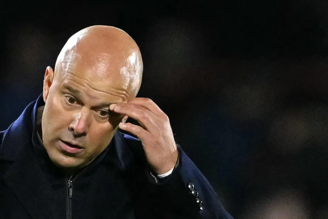 Liverpool's Dutch manager Arne Slot reacting after the final whistle following the 3-2 away loss against Brentford at the Brentford Community Stadium in London on Oct 25, 2025. 