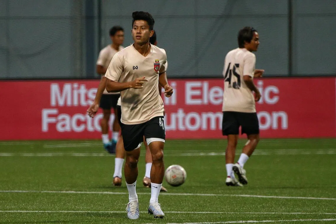 ST20221223_202226417997/Feline Lim/dgsoc23

Hein Htet Aung of the Myanmar football team, photographed during training before their match against Singapore in the AFF Championship, photographed at Jalan Besar Stadium in Singapore on 23 Dec 2022.