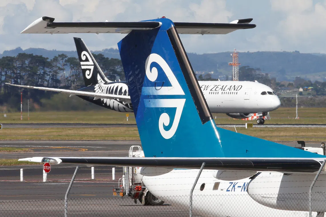 FILE PHOTO: An Air New Zealand aircraft takes off from Auckland Airport in New Zealand,  September 20, 2017. REUTERS/Nigel Marple/File Photo