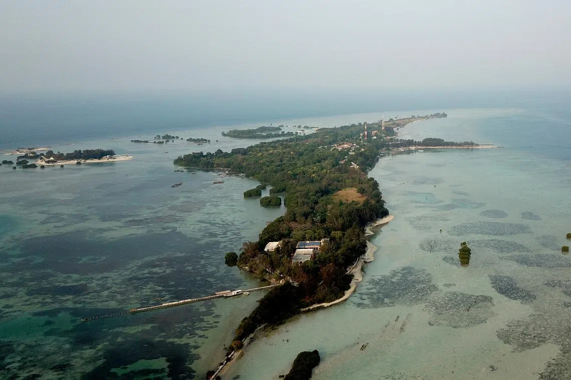 Pulau Pari, north of Jakarta, risks disappearing under rising sea levels, and flooded five times last year, says an NGO backing the islanders.