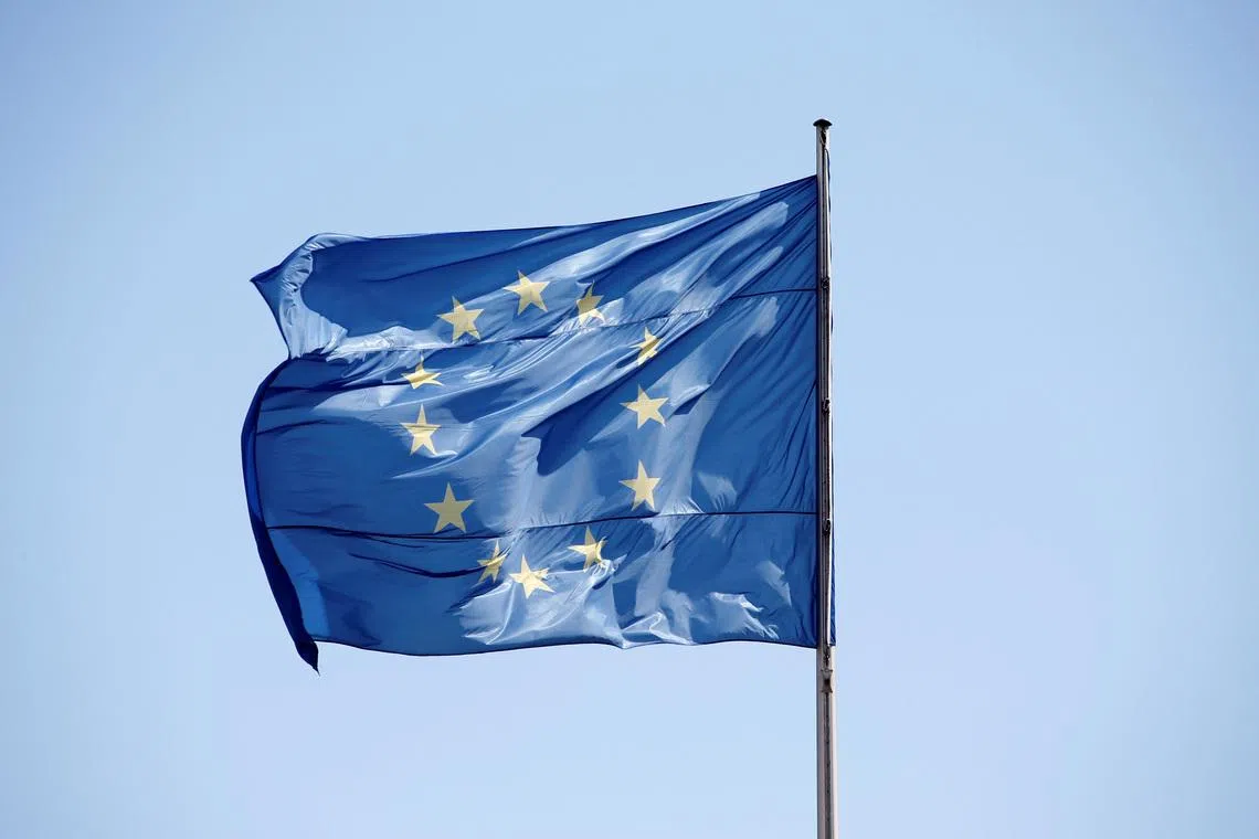 FILE PHOTO: The European Union (EU) flag is seen on a sunny day and blue sky at the Chancellery in Berlin, Germany, April 29, 2016.    REUTERS/Fabrizio Bensch/File Photo