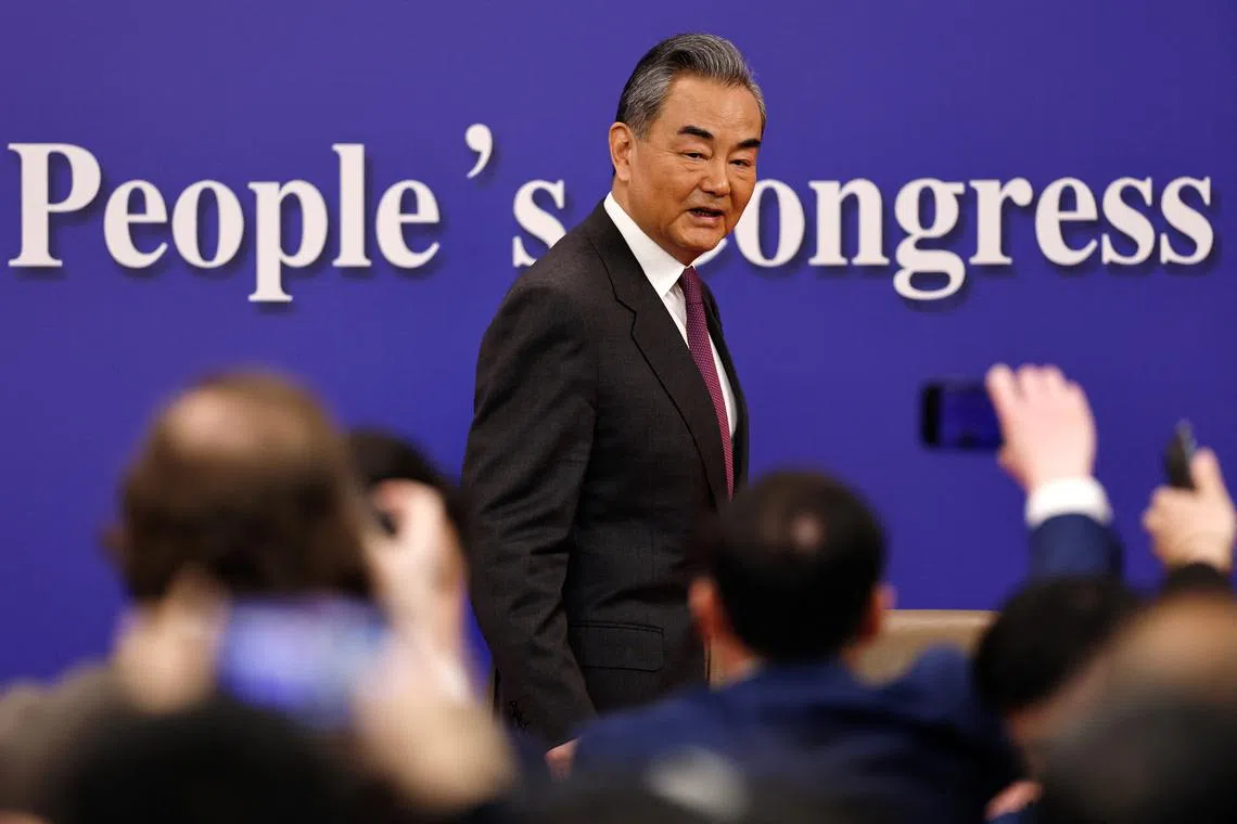 Chinese Foreign Minister Wang Yi attends a press conference on the sidelines of the National People's Congress (NPC), in Beijing, China March 7, 2024. REUTERS/Tingshu Wang