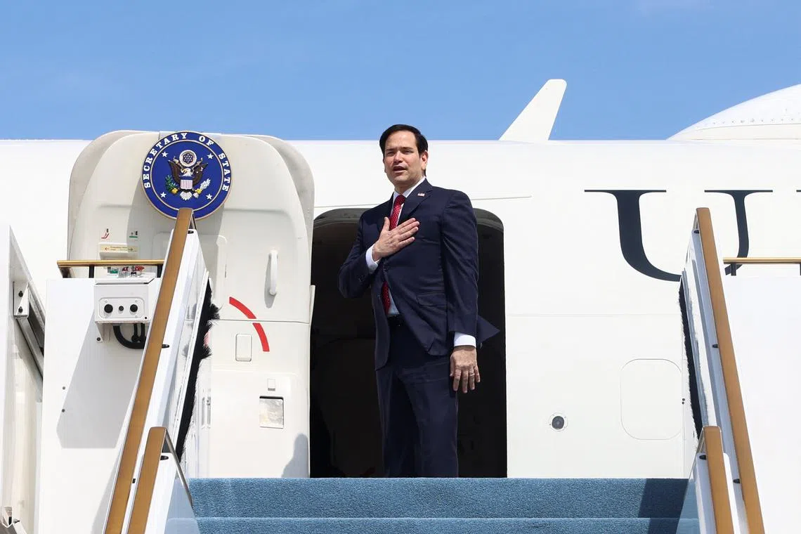 U.S. Secretary of State Marco Rubio boards an aircraft to depart to the U.S., in Abu Dhabi, United Arab Emirates, February 19, 2025. REUTERS/Evelyn Hockstein/Pool