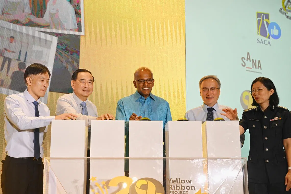 (From left) Mr Sunny Lee, Chief Executive Officer of the Yellow Ribbon Singapore, Mr Philip Tan, chairman of the Yellow Ribbon Singapore, Mr K Shanmugam, Minister for Law and Home Affairs, Mr Pang Kin Keong, Permanent Secretary of the Ministry of Home Affairs, and Ms Shie Yong Lee, Commisioner of Prisons, launching the 20th Anniversary of the Yellow Ribbon Project at the Singapore Prison Service and Yellow Ribbon Singapore Corporate Advance 2024 on Apr 30. 

ST PHOTO: AZMI ATHNI